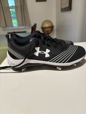 Under Armour Black and White Softball or Soccer cleats. Never worn.